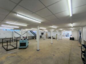 Commercial LED lighting installation in Peterborough factory mezzanine with high-bay LED lighting