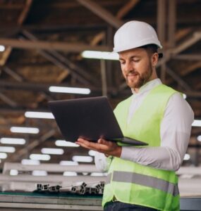 Industrial electrical contractor carrying out a warehouse inspection